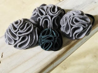 leather and wool flower hair ties