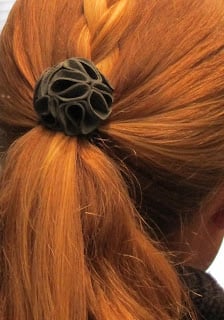 leather flower hair tie on ponytail