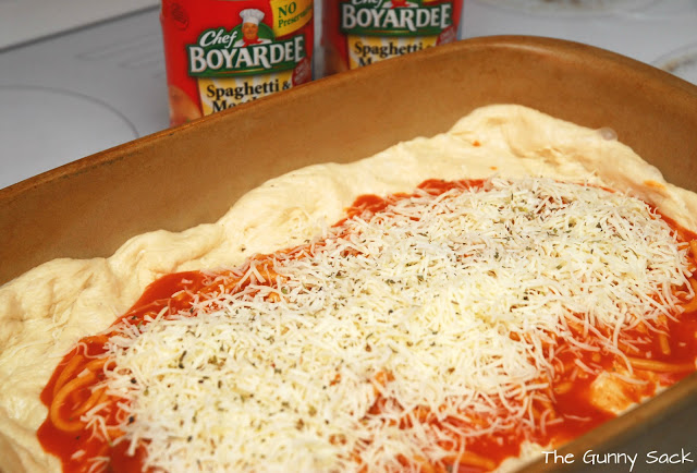 dough with sauce and cheese