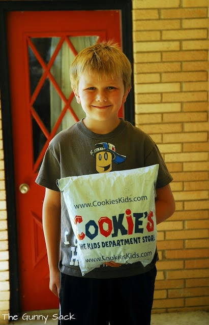 boy holding package