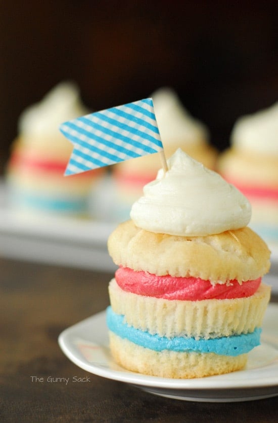 blue flag on top of cupcake