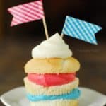 layered red, white, and blue cupcake with toothpick flags on top