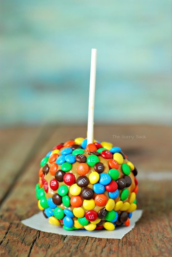 Caramel Apple covered with M&Ms