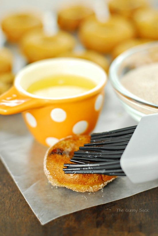 brush donut with melted butter