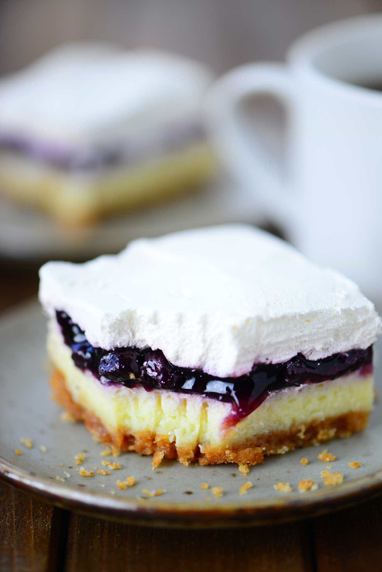 Blueberry Cheesecake Dessert Slice On Blue Plate