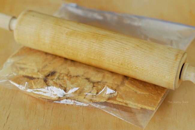 crush graham crackers with rolling pin