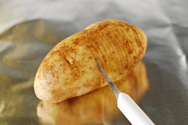 Making Slices in Baked Potato
