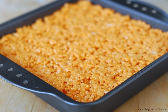 Orange Rice Krispie Treats in pan