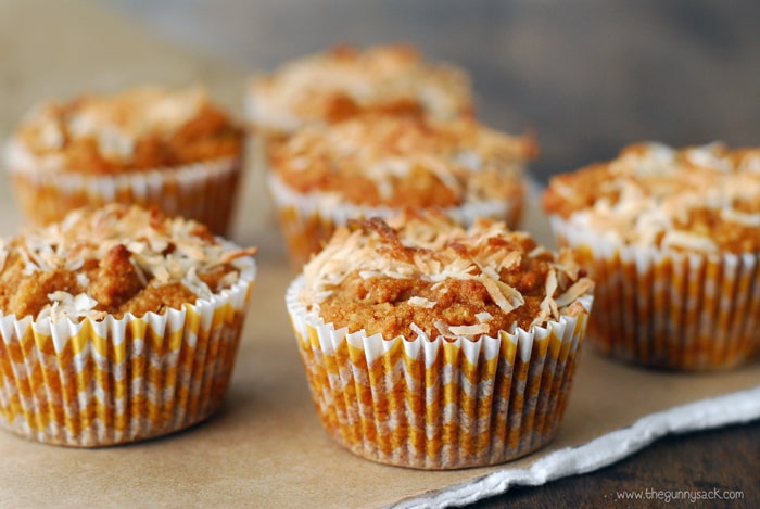 pina colada muffins topped with coconut