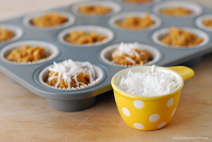 coconut topped pina colada muffins ready to be baked