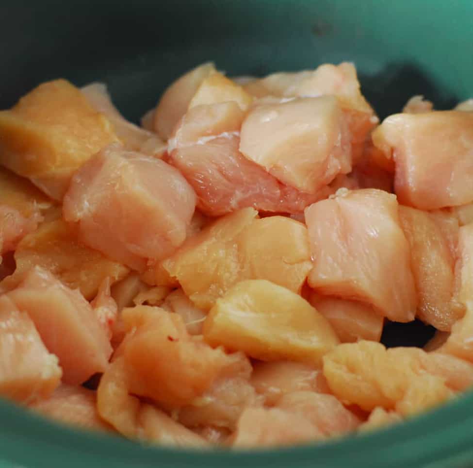 raw cubed chicken in slow cooker