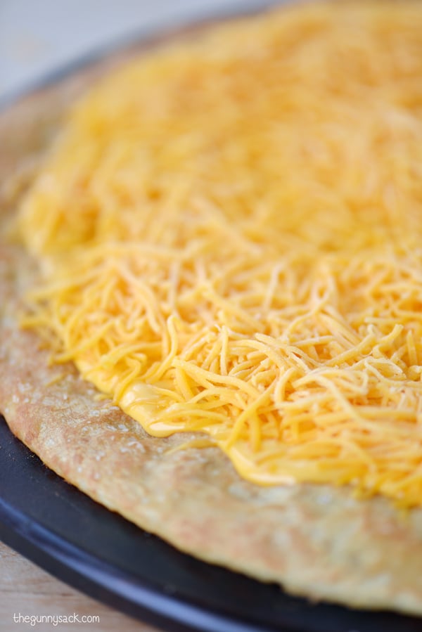 Sprinkle Cheese on Crust