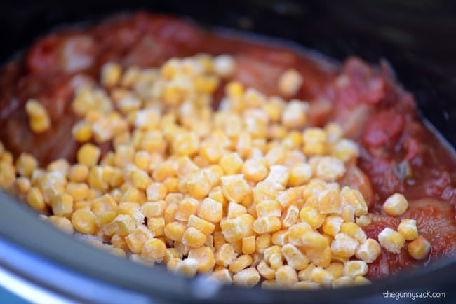 add corn to slow cooker