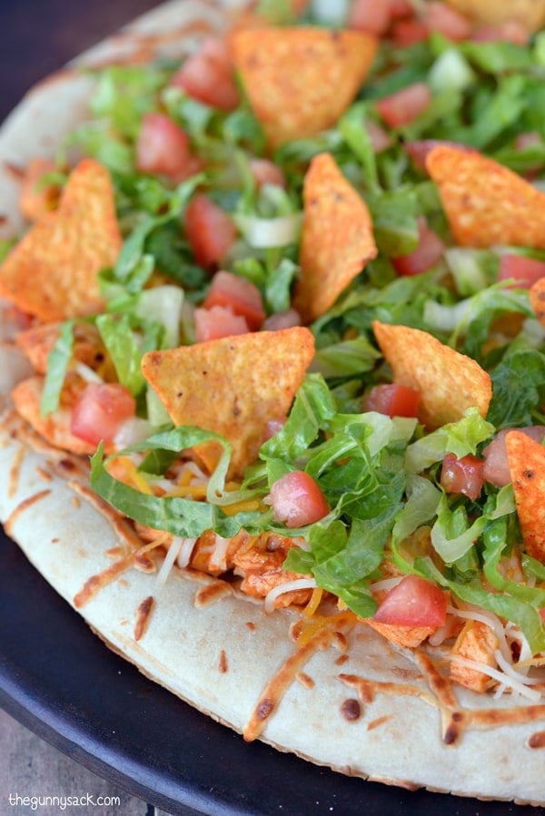 Taco Pizza with tomatoes and doritos