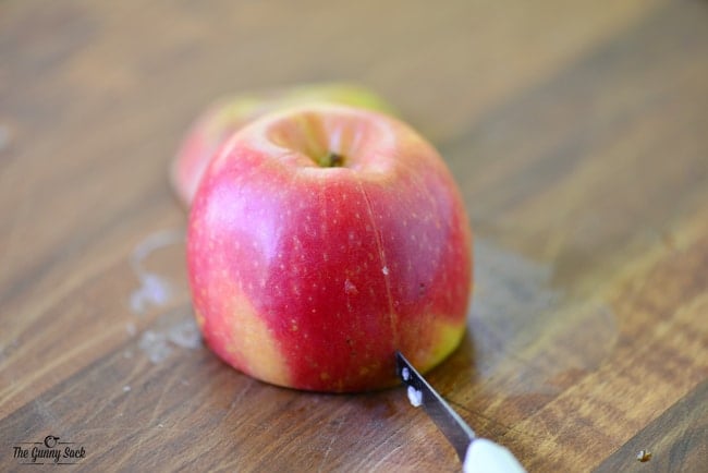 Cut slits around the apples