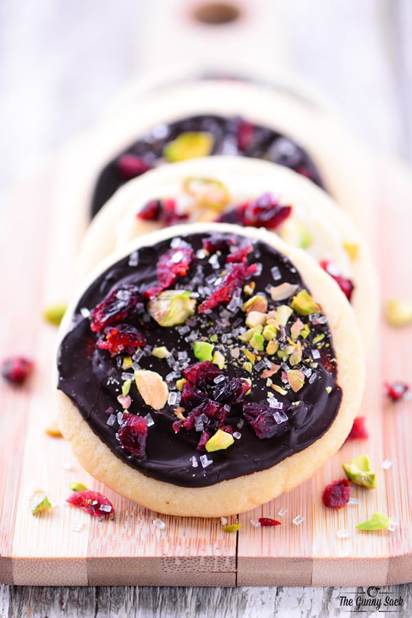 Shortbread Cookies Topped with Dark Chocolate Pistachios and Cranberries