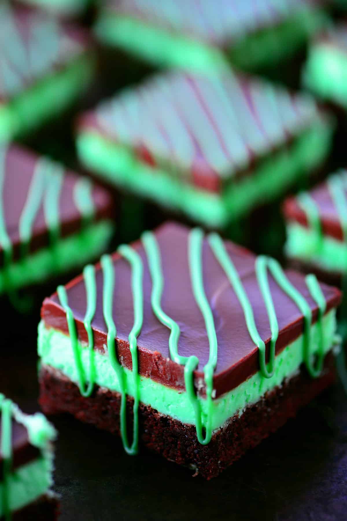 Chocolate mint brownies with mint buttercream and ganache on top.