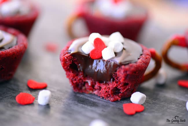 Red Velvet Hot Chocolate Cookie Cups with bite removed