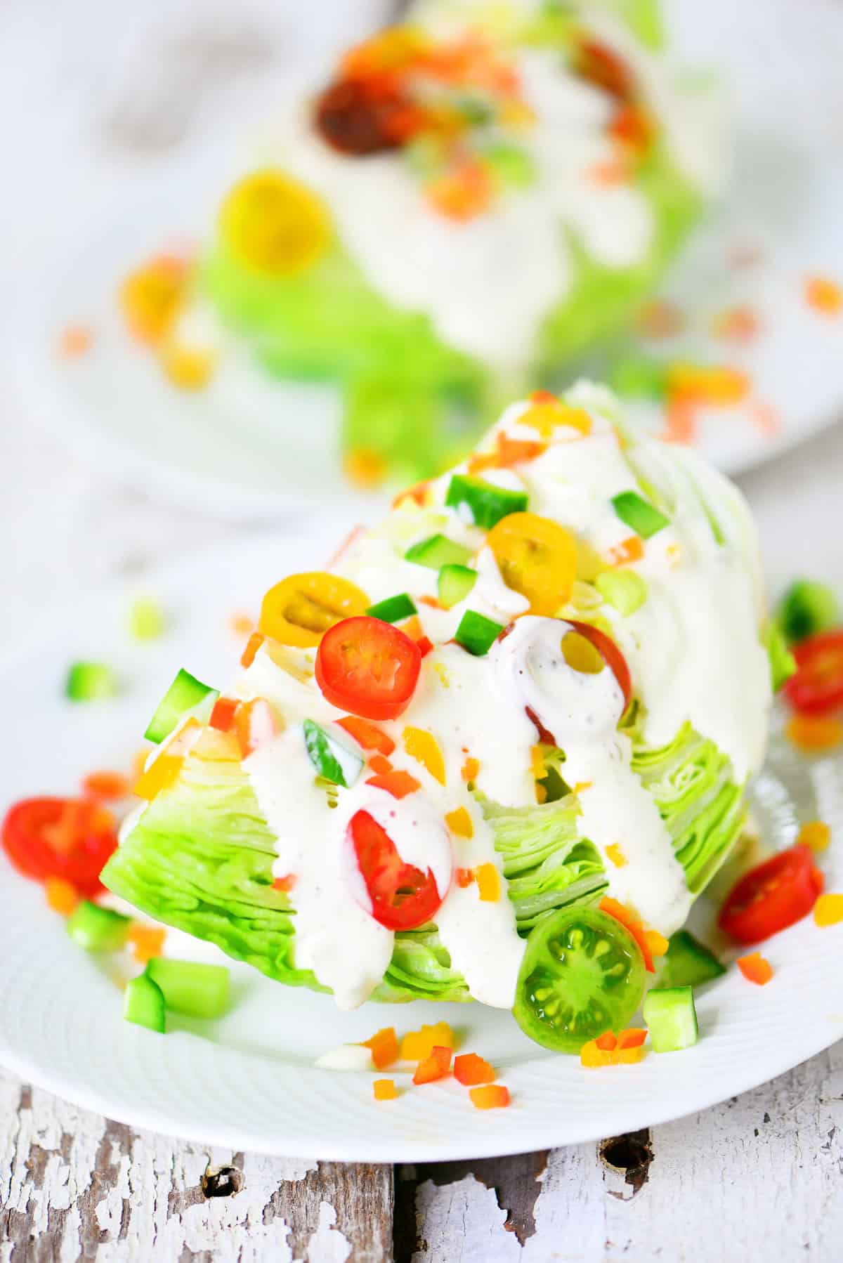 summer wedge salad on a white plate