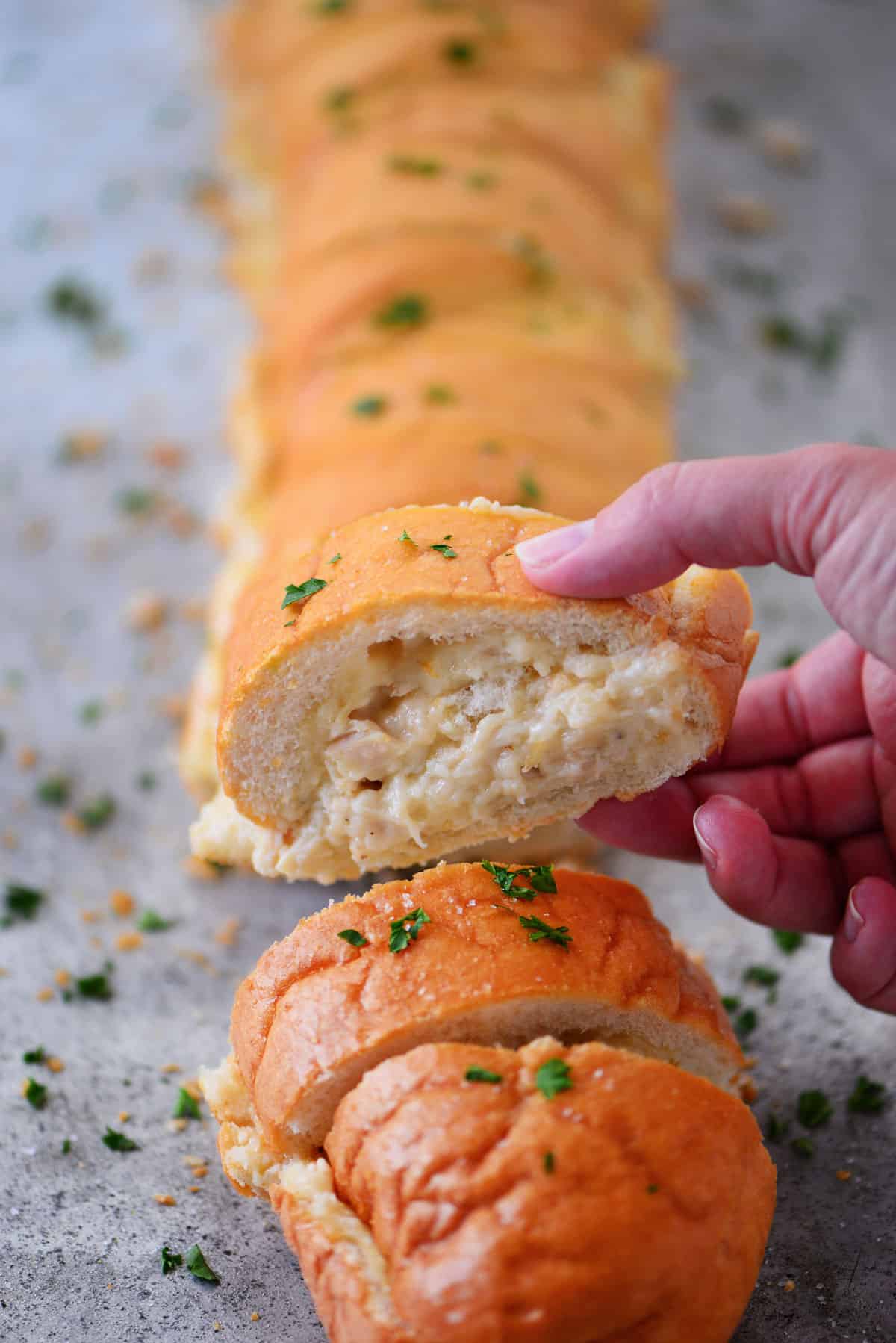 chicken alfredo french bread with one piece cut out