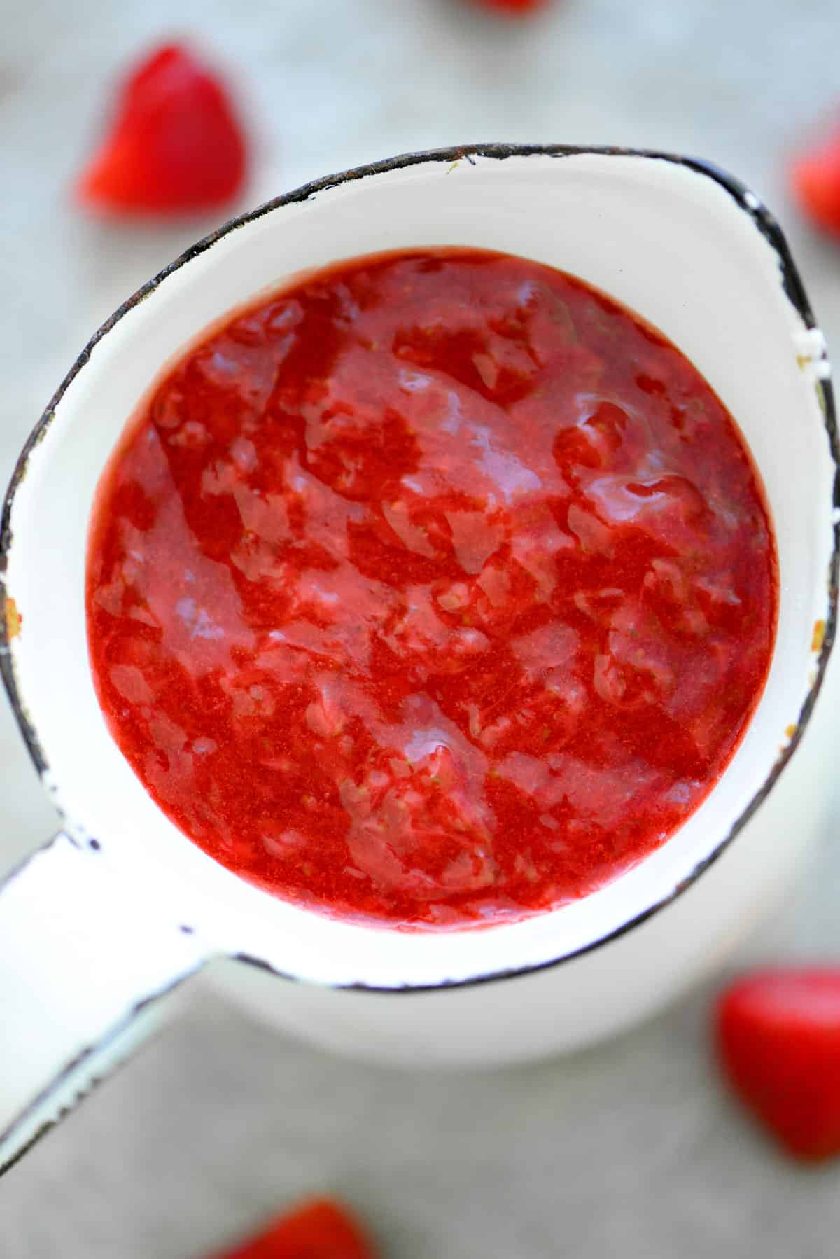 strawberry sauce in a pitcher