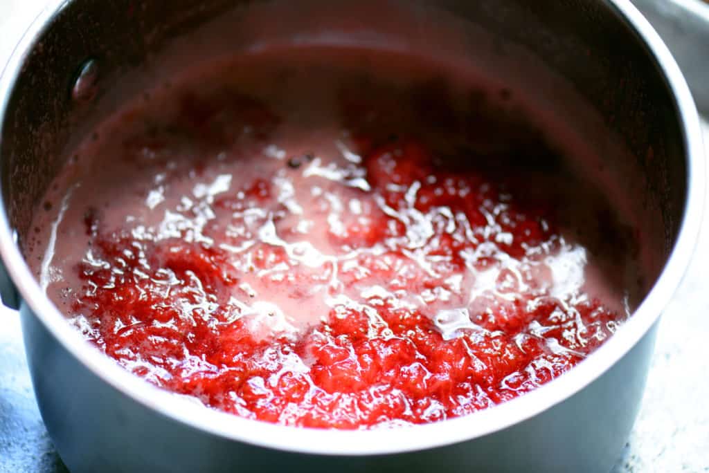 boiling strawberry sauce in pot