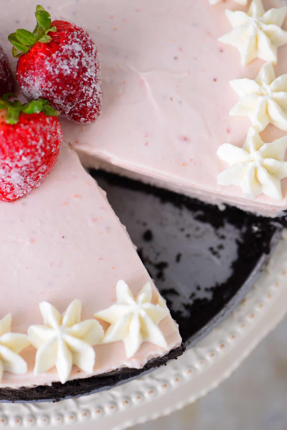 a slice out of the strawberry cheesecake