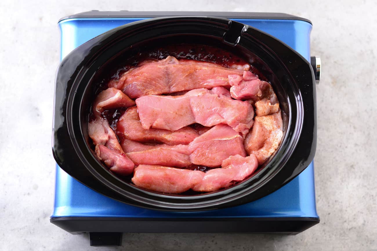 raw rib meat in a crockpot