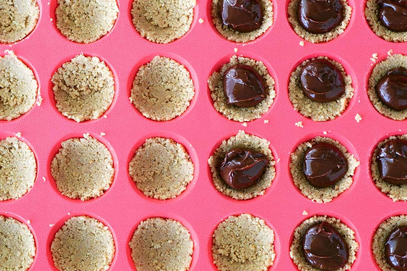 chocolate filled no bake s'mores cookie cups in pan