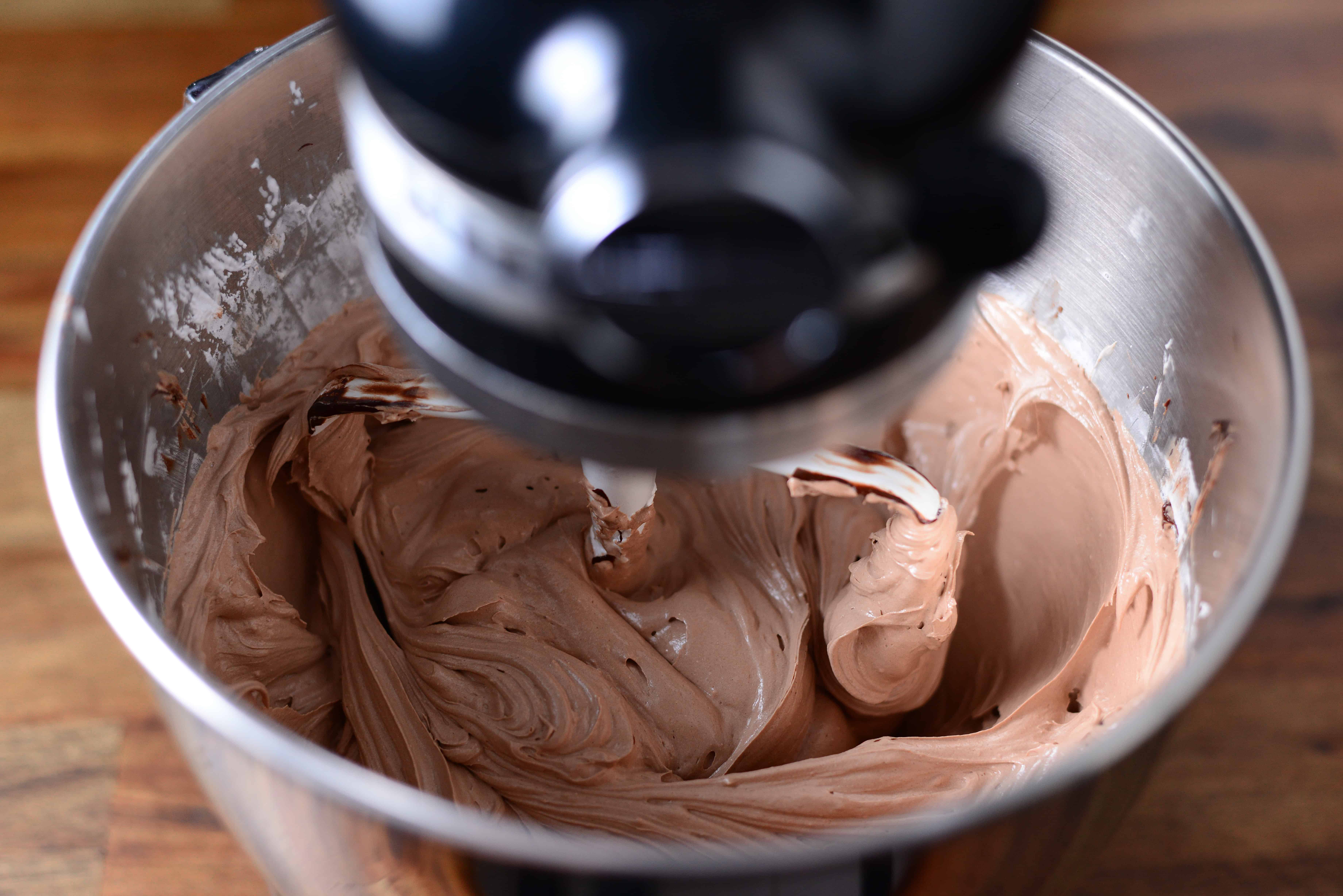 chocolate mixing into the meringue
