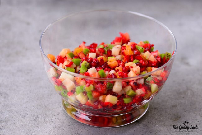 mixed chopped fruit in a glass bowl