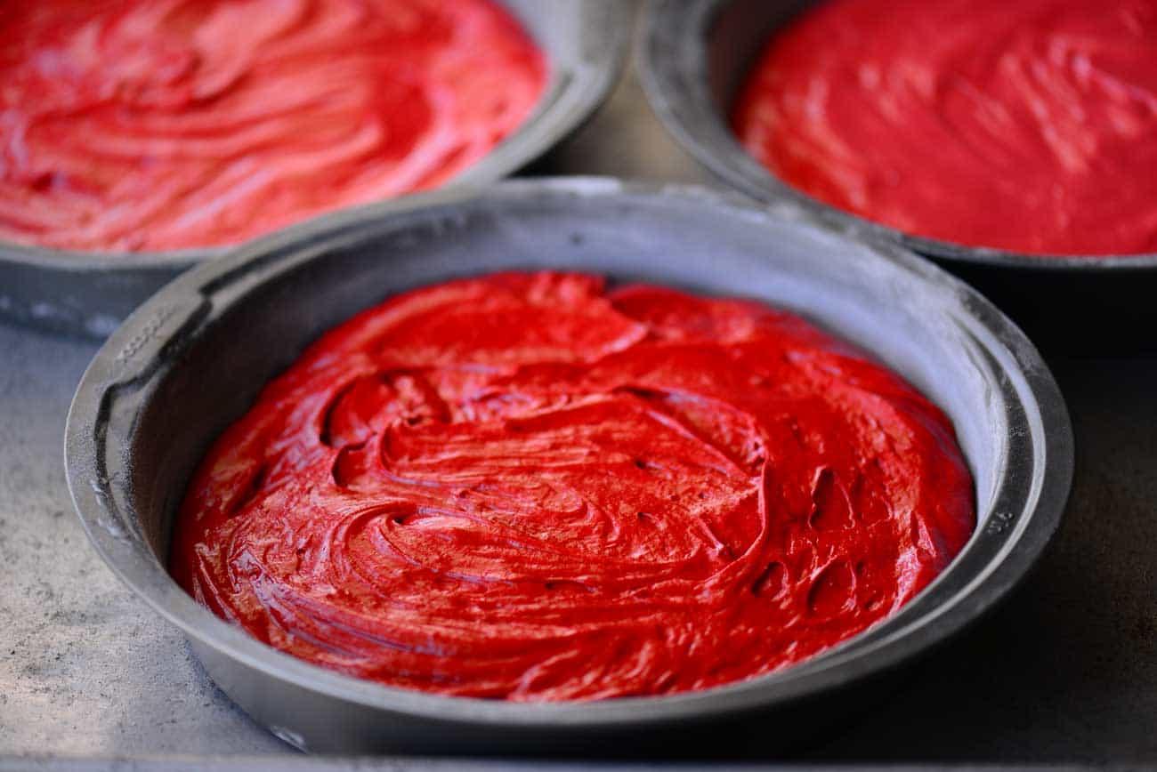 red cake in pans