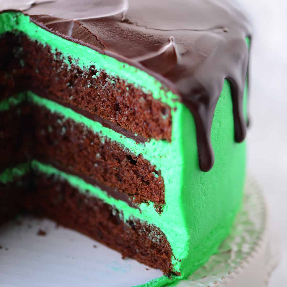 Chocolate mint cake with a sliced removed.