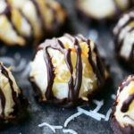 Homemade coconut macaroons with chocolate on top.