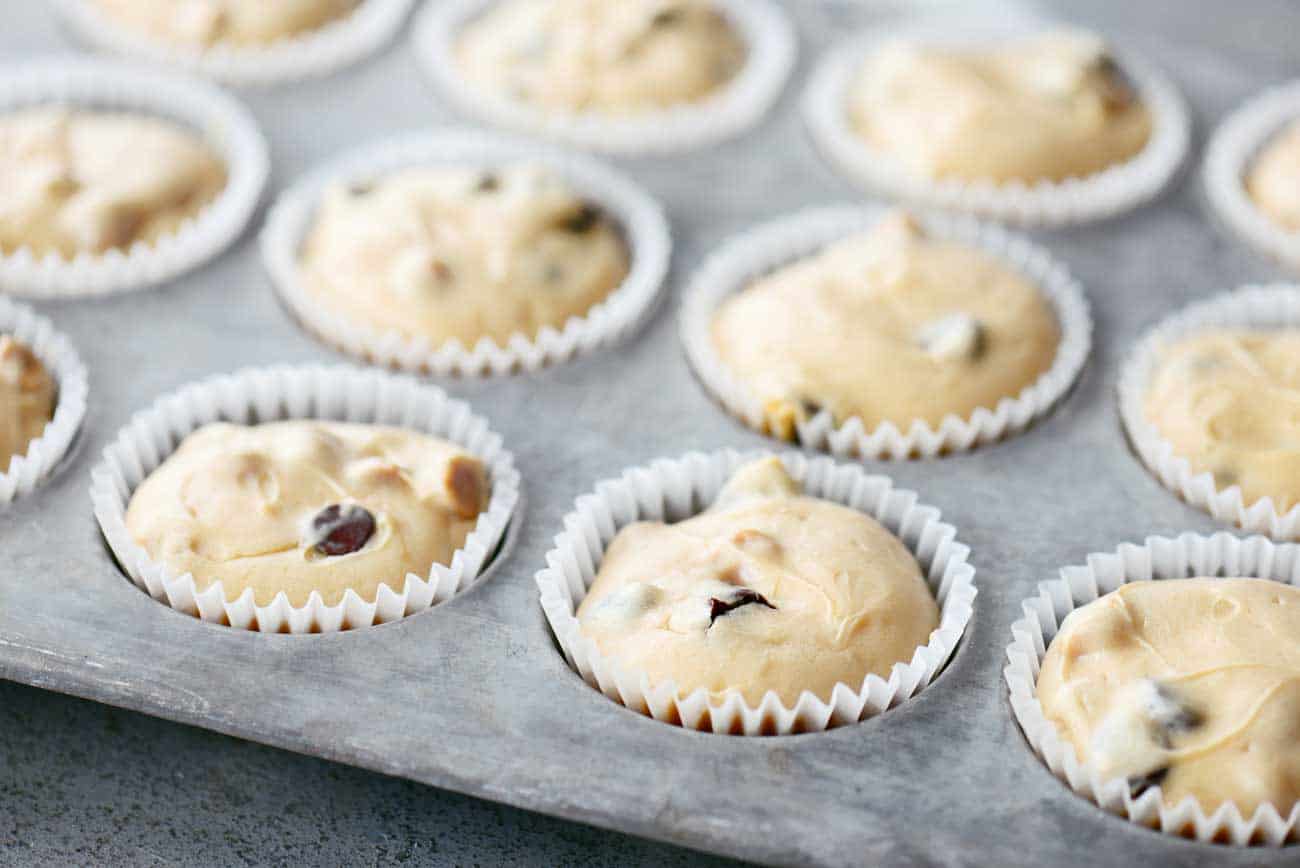 baked mini peanut butter cheesecakes in muffin pan