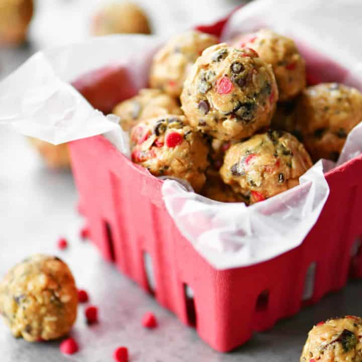 chocolate cherry energy balls protein bites in red berry basket