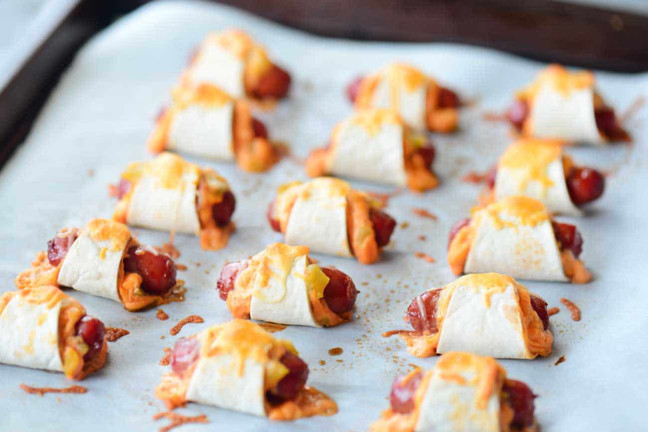 Mexican Pigs In A Blanket On A Baking Sheet