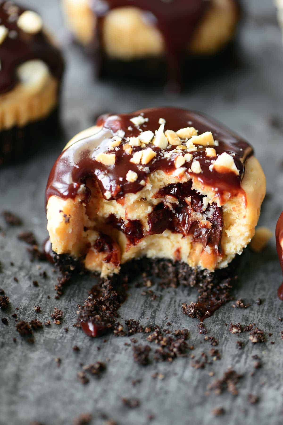 mini peanut butter cheesecake with a bite taken out of it