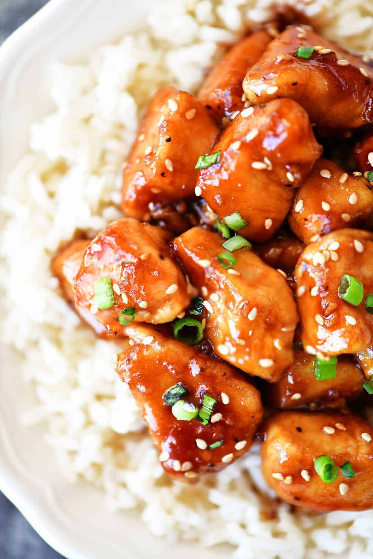 honey garlic chicken with rice in a bowl