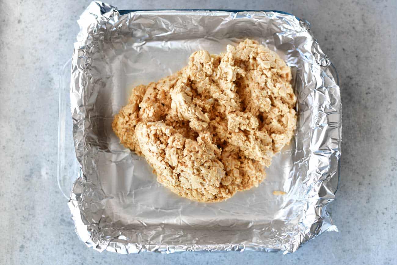 peanut butter bars dough in pan