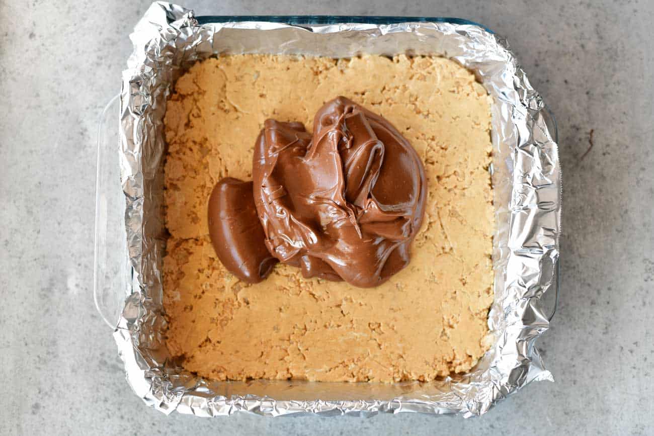 melted frosting on peanut butter bars