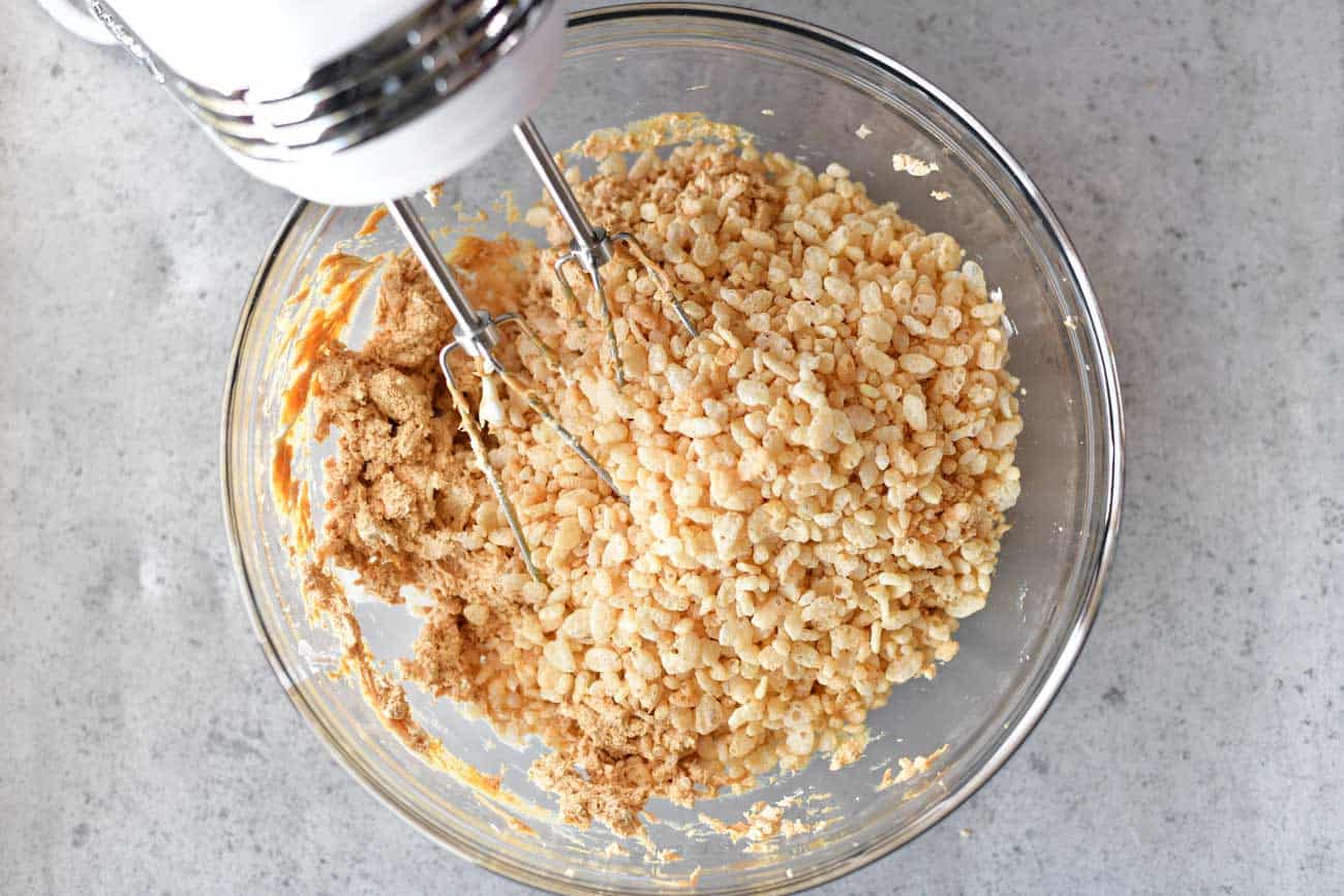 rice krispies mixed into the peanut butter bars dough