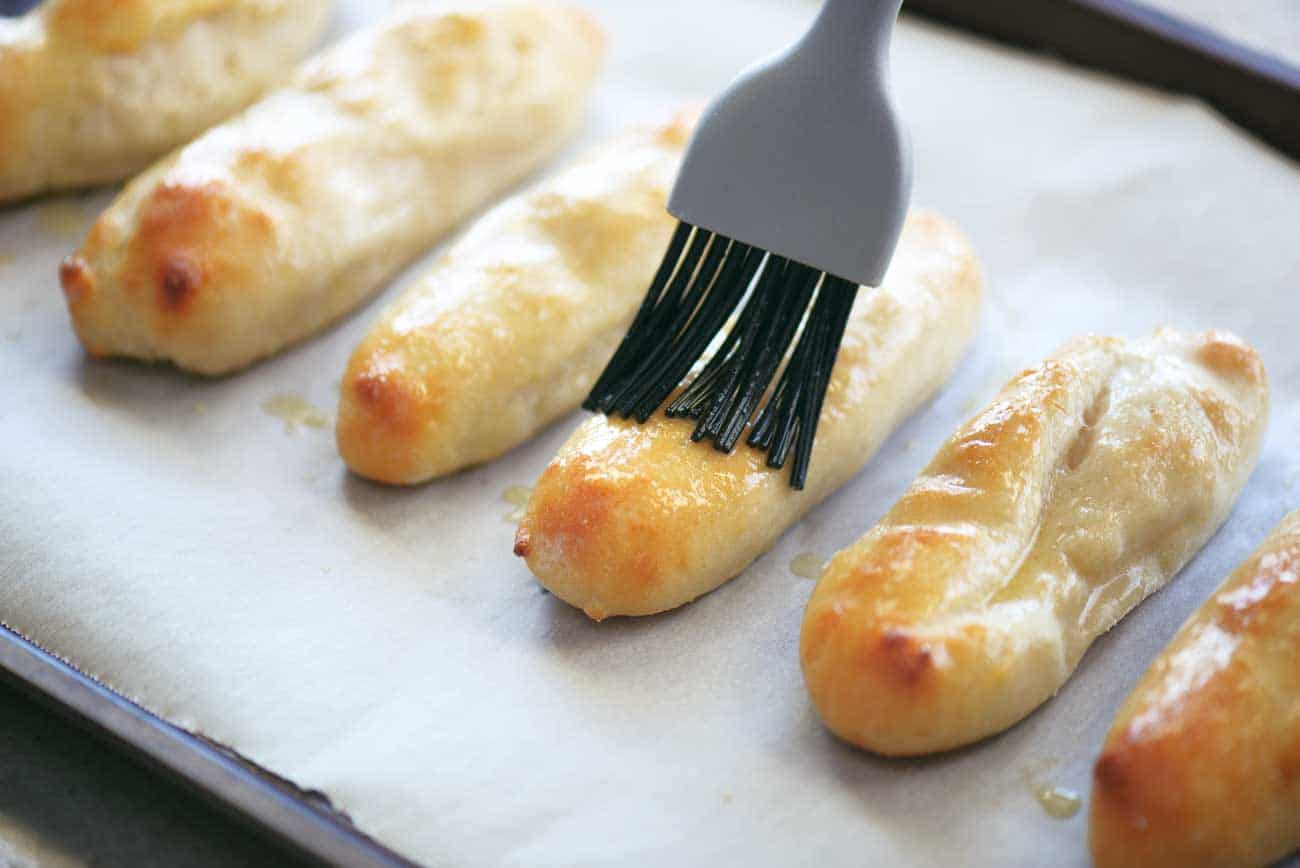 garlic butter brushed on two ingredient dough breadsticks