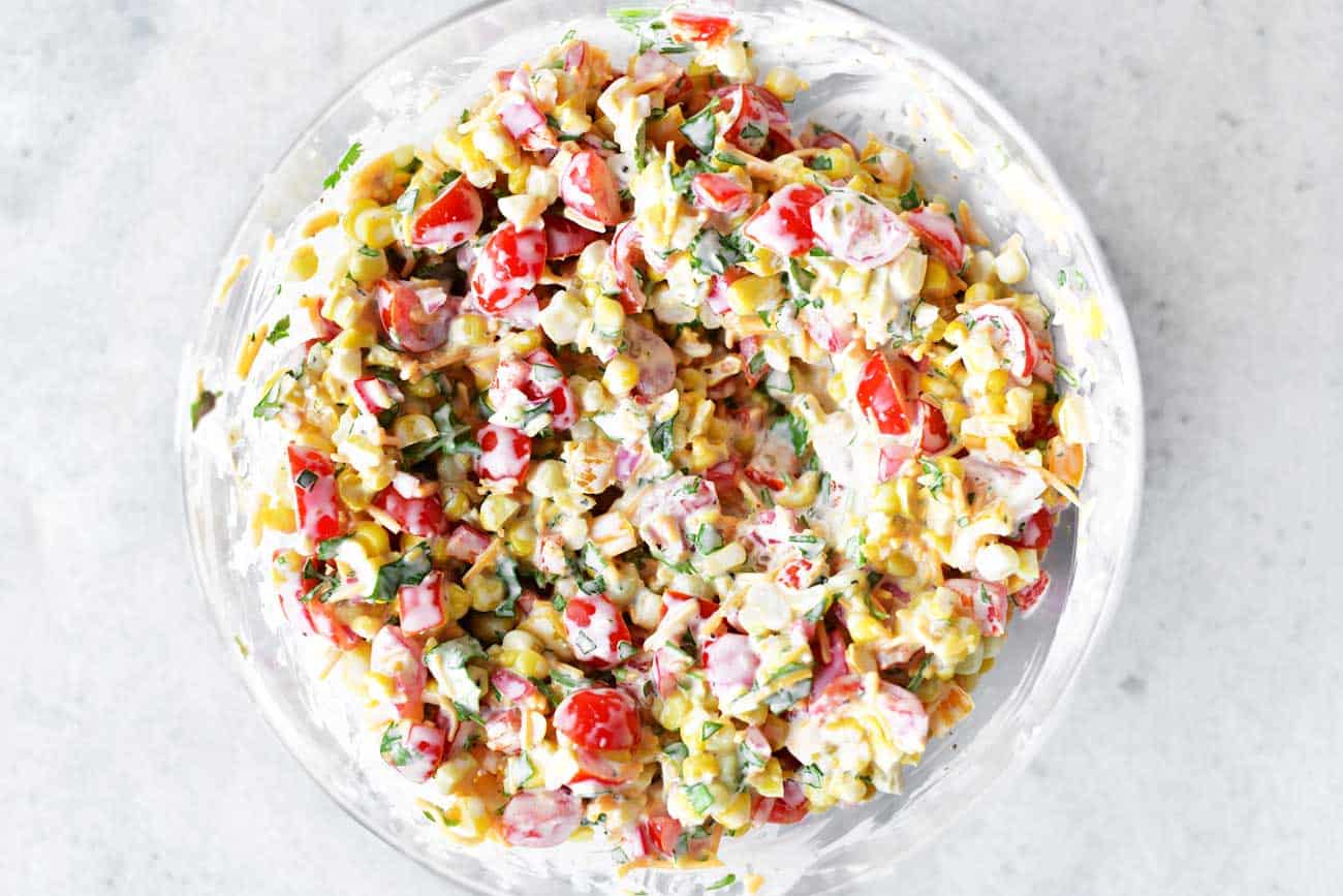 creamy corn salad in bowl