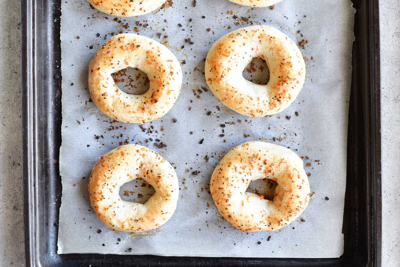 oven baked garlic herb bagels made from two ingredient dough