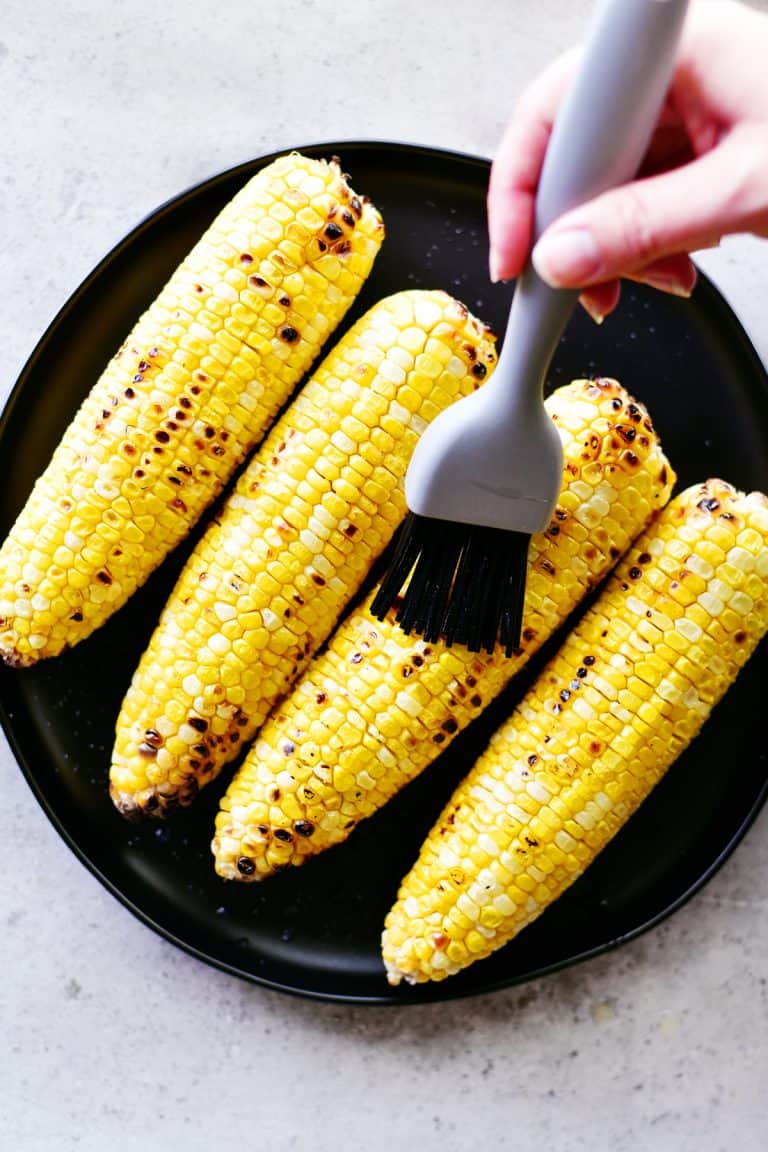 buttered grilled corn on the cob peeled