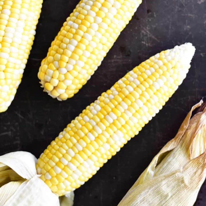 peeling oven roasted corn on the cob