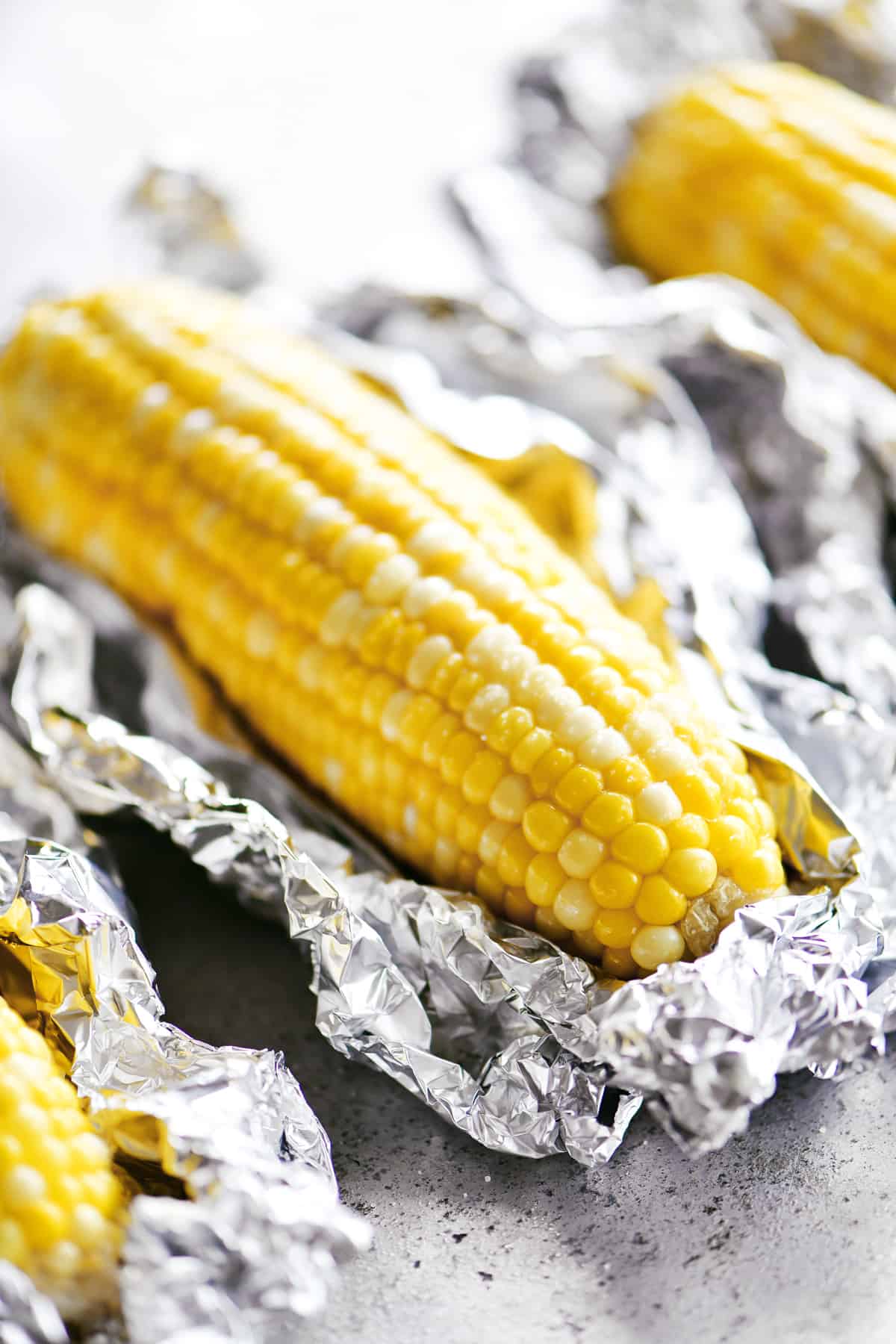 baked oven roasted foil wrapped corn on the cob