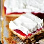 strawberry cheesecake dessert slice in pan