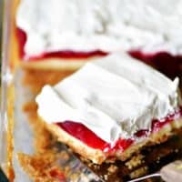 strawberry cheesecake dessert slice in pan